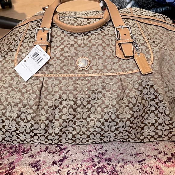 Coach Handbags - NWT Coach Voyage Signature Cabin Bag F77115